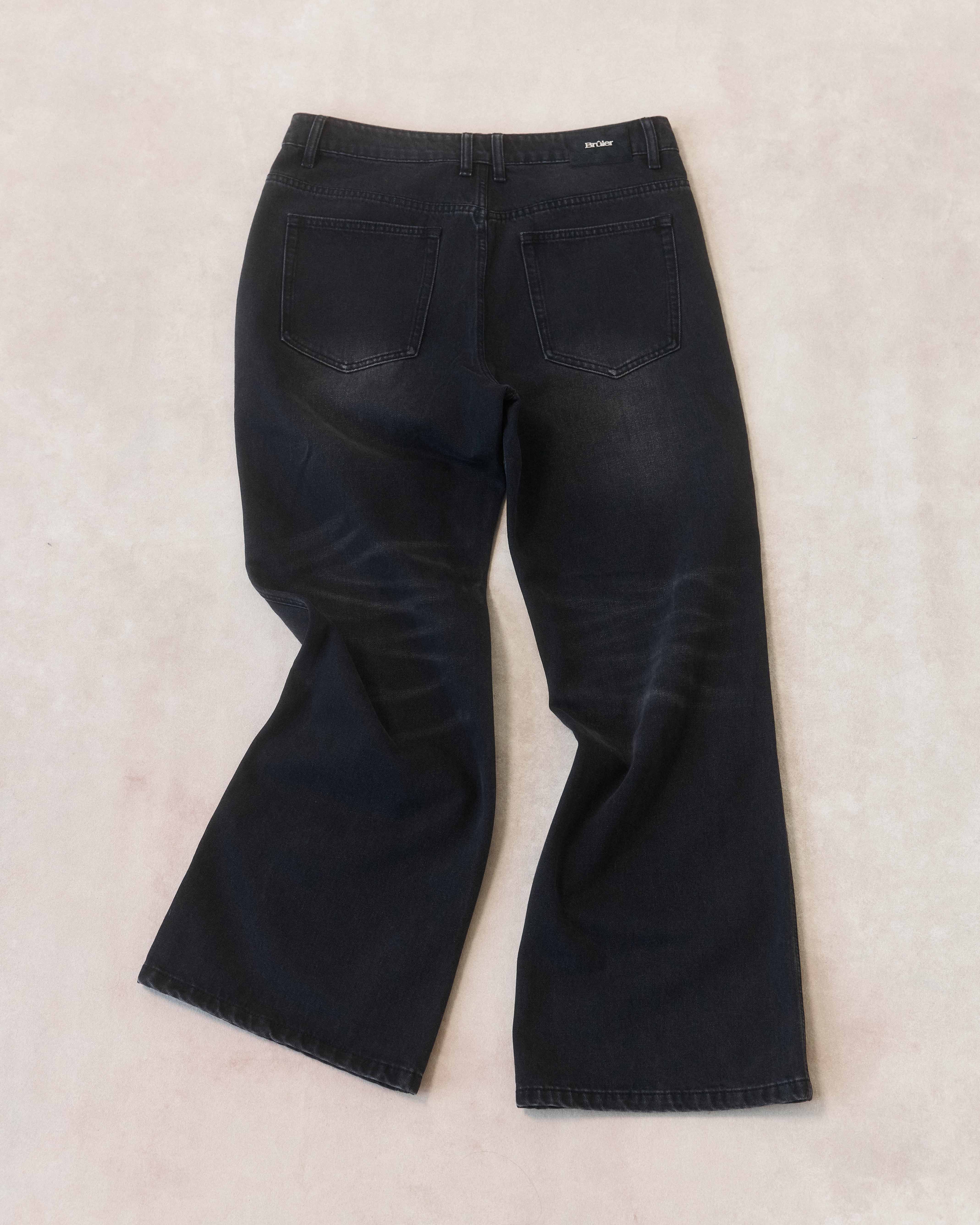 Джинсы «Клёш» чёрные с эффектом варки